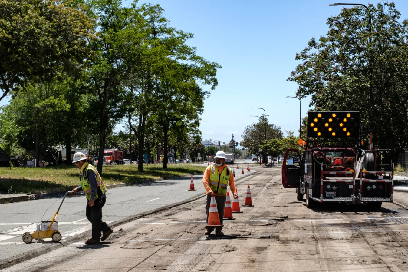 Workers repaving Adeline St.