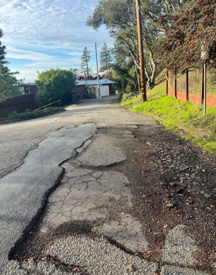 Badly broken street pavement